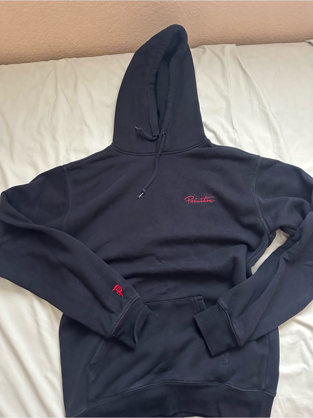 Primitive Black Hoodie with Red Script Logo